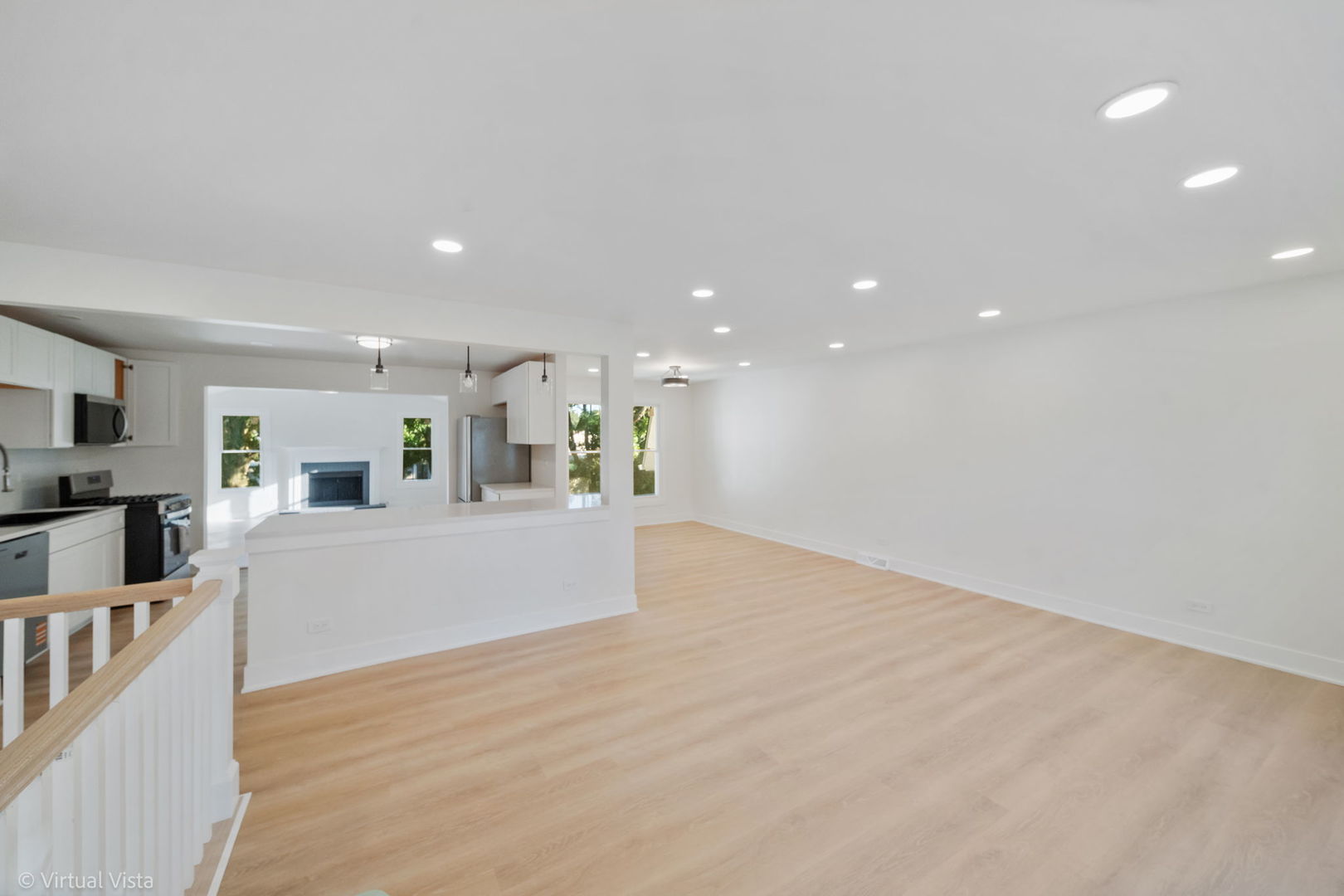 451 Alcester Court Bolingbrook, IL 60440 - Photo 9 of 22 a view of kitchen and hall with wooden floor