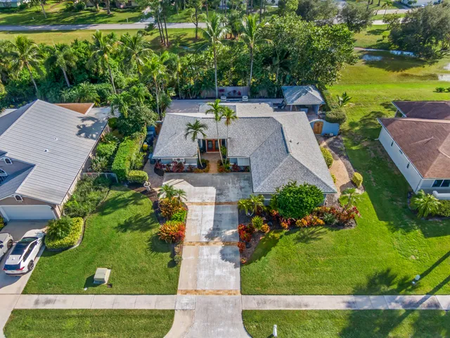 an aerial view of a house with a garden