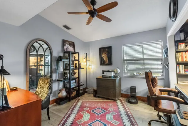 a bed room with a bed and a window