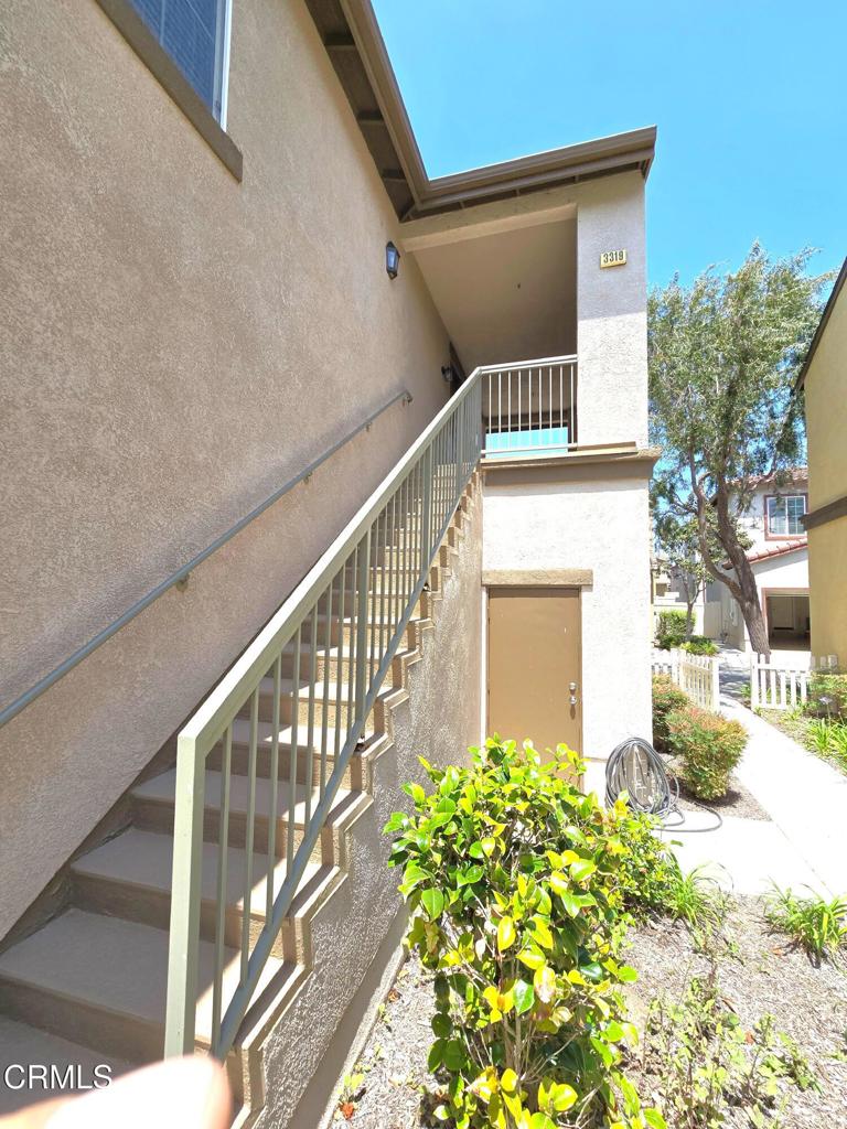 3319 North Ventura Road Oxnard, CA 93036 - Photo 18 of 25 a view of a house with a flower garden