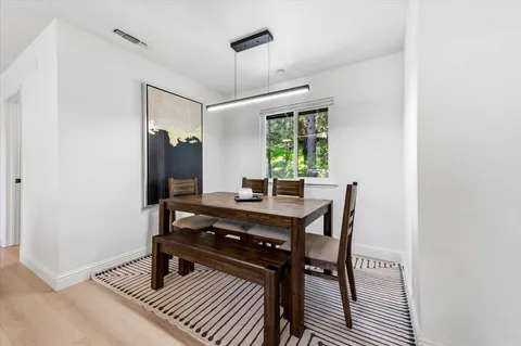 a view of a workspace with furniture