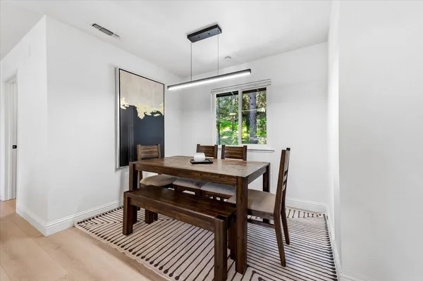 a view of a workspace with furniture