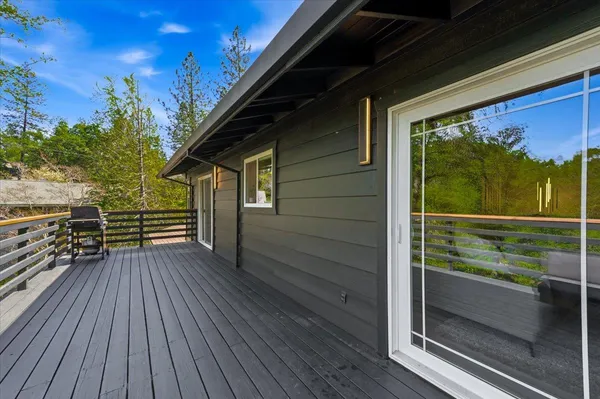 a view of a yard with an outdoor seating