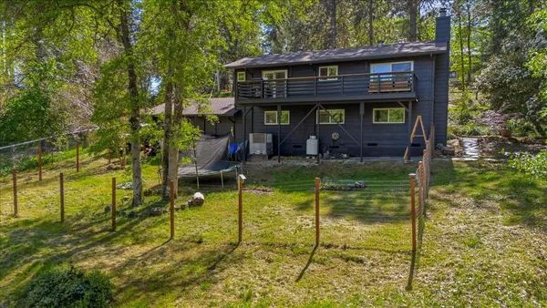 a view of a swimming pool with a bench