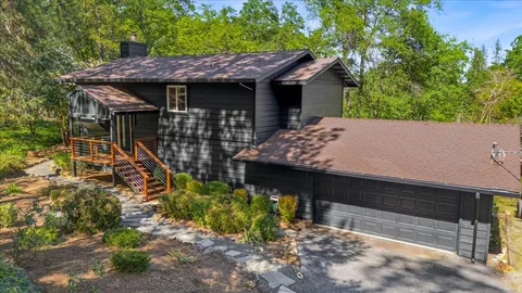 a view of a house with roof deck