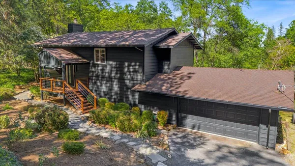 a view of a house with roof deck