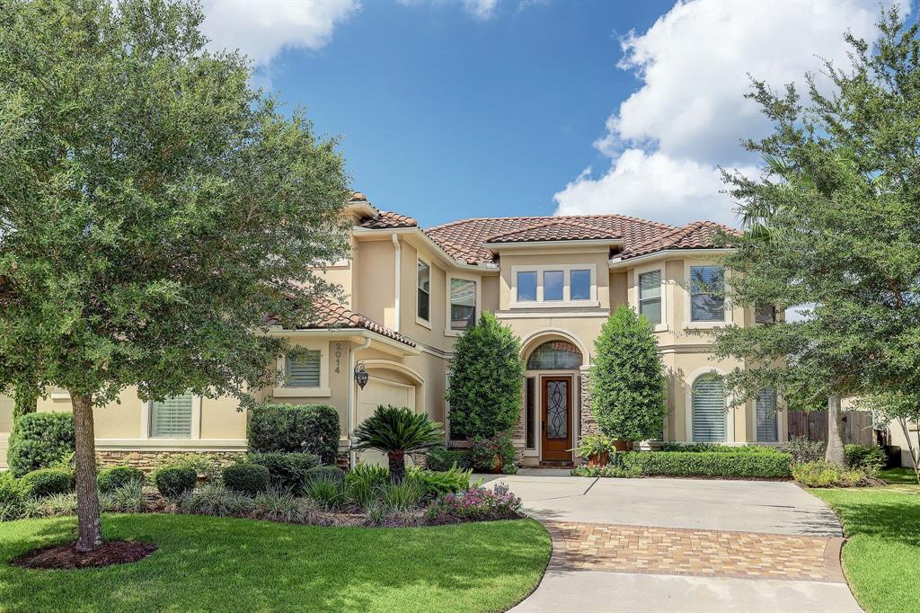 Stunning Mediterranean Residence offers a splendid curb appeal, tile roof, double pane windows for energy efficiency, 4 bedrooms and a fabulous backyard.