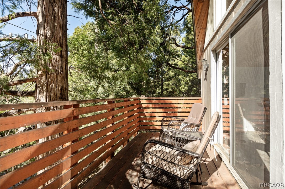 316 Pioneer Road Lake Arrowhead, CA 92352 - Photo 15 of 35 a view of an outdoor space with seating area