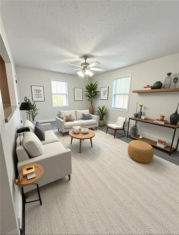 554 Fort Street Northeast Marietta, GA 30060 - Photo 5 of 15 a living room with furniture and a chandelier