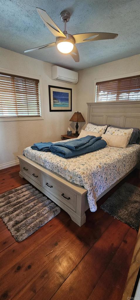 405 Solana Real Fallbrook, CA 92028 - Photo 6 of 11 a bed sitting in a bedroom next to a window