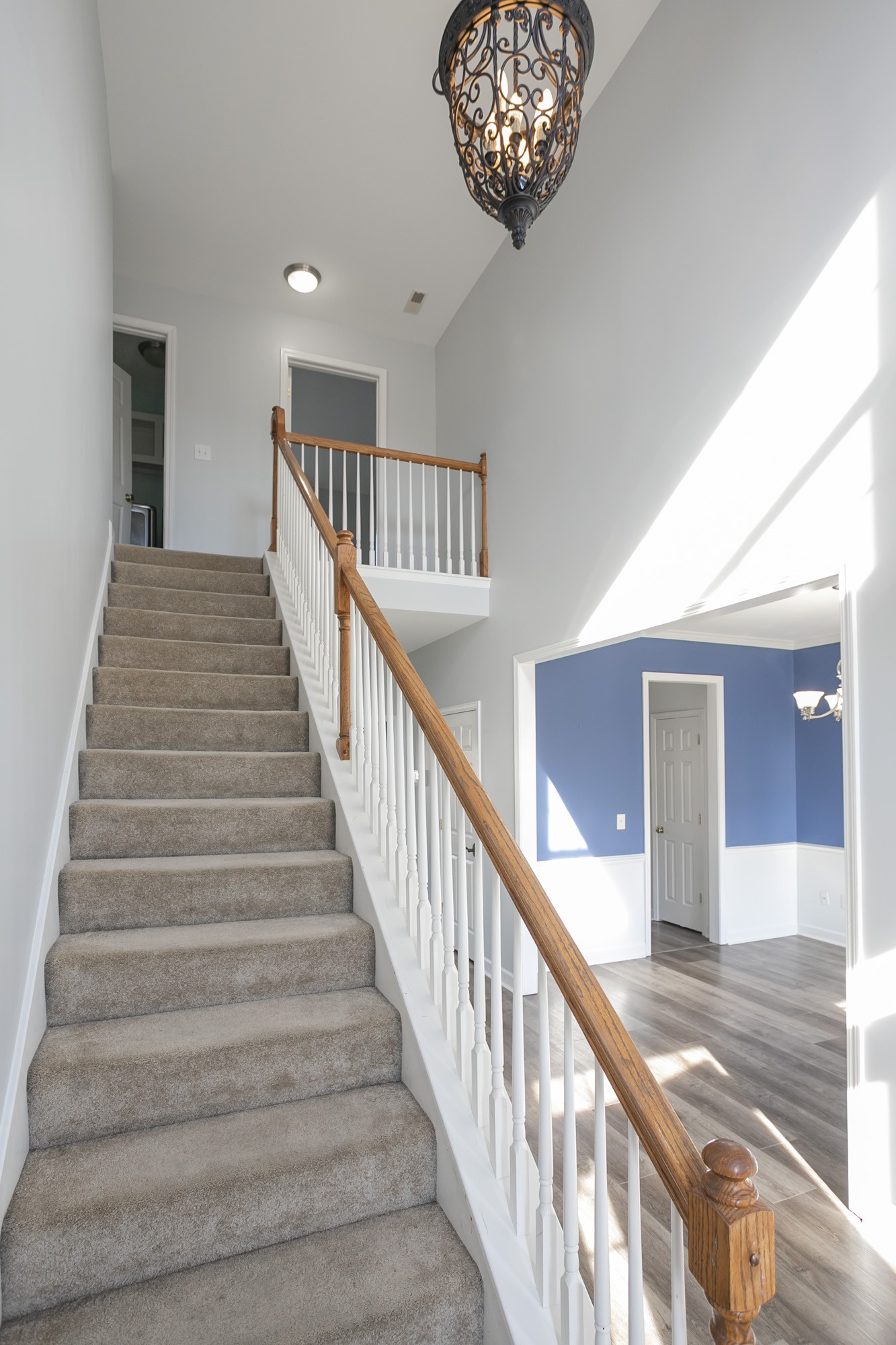6004 Romain Court Spring Hill, TN 37174 - Photo 23 of 48 a view of entryway and hall with wooden floor