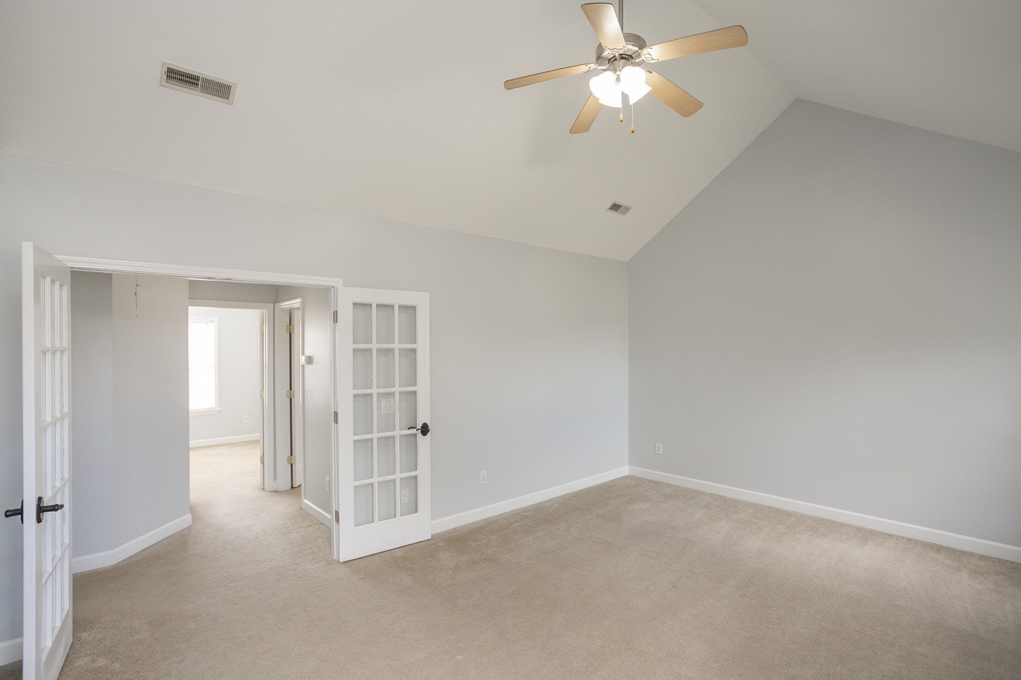 6004 Romain Court Spring Hill, TN 37174 - Photo 34 of 48 an empty room with closet and a ceiling fan
