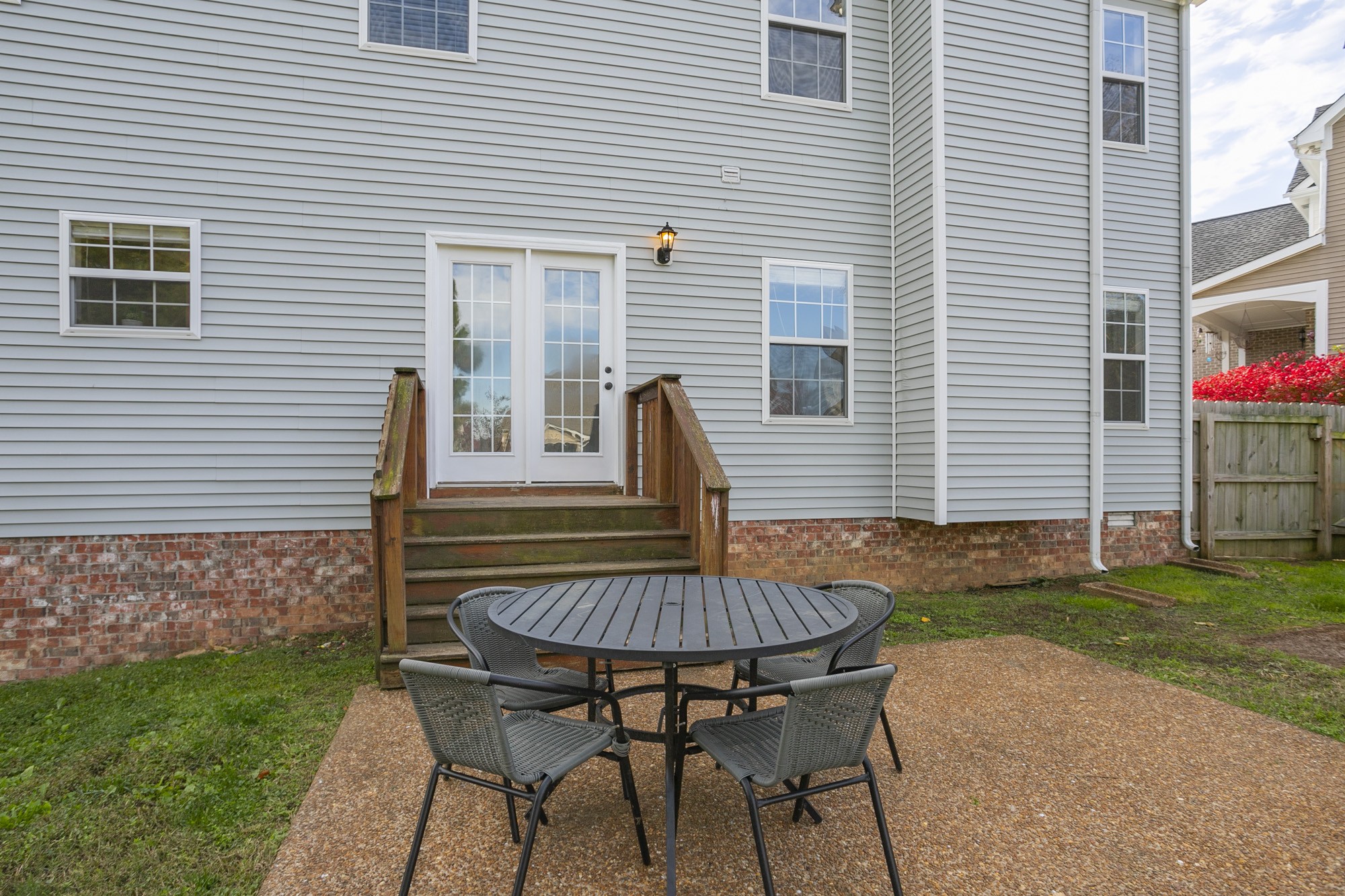 6004 Romain Court Spring Hill, TN 37174 - Photo 46 of 48 a backyard of a house with table and chairs