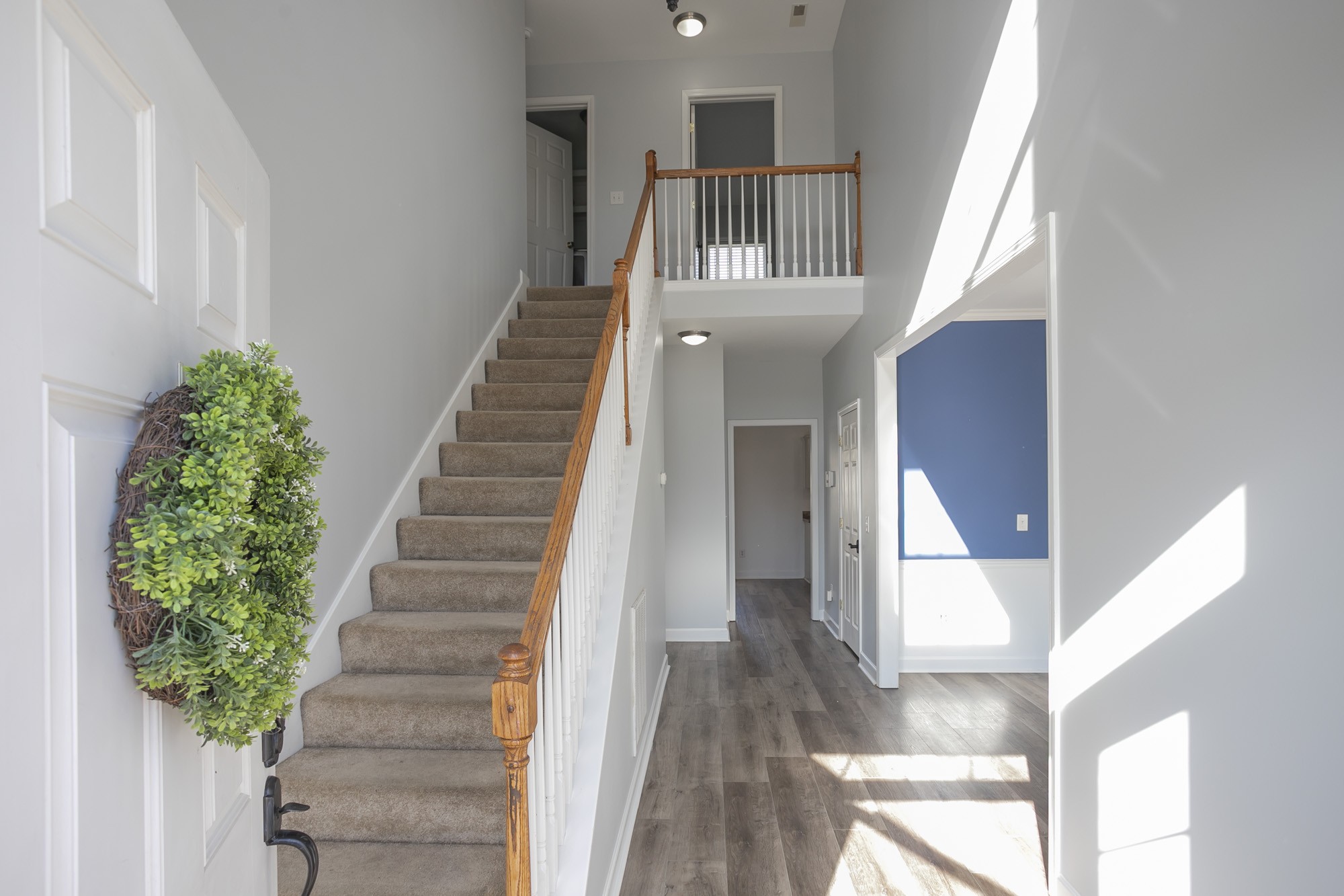 6004 Romain Court Spring Hill, TN 37174 - Photo 5 of 48 a view of entryway and hall with wooden floor