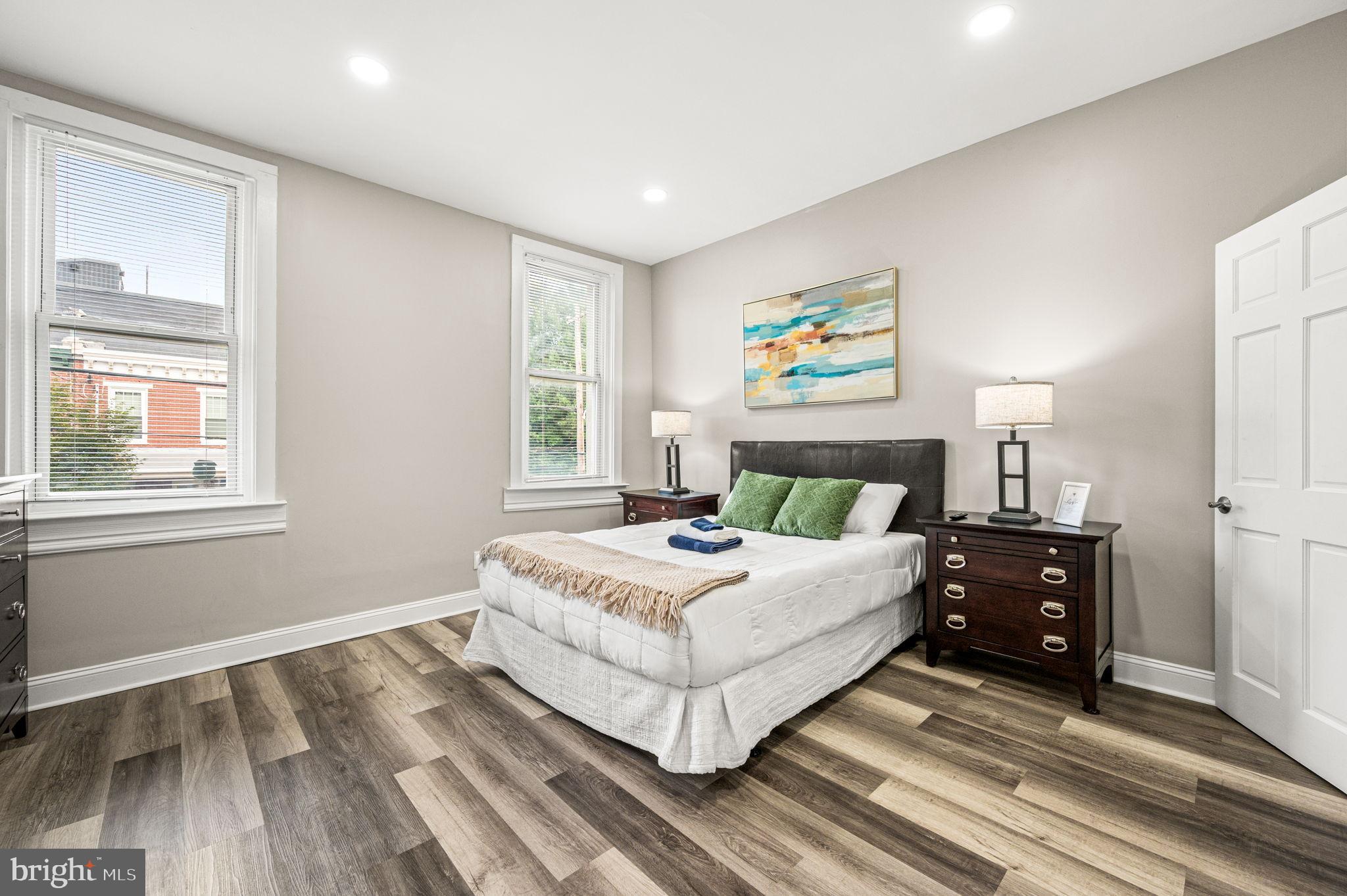 930 North 30th Street Philadelphia, PA 19130 - Photo 14 of 20 a bedroom with a bed and a window