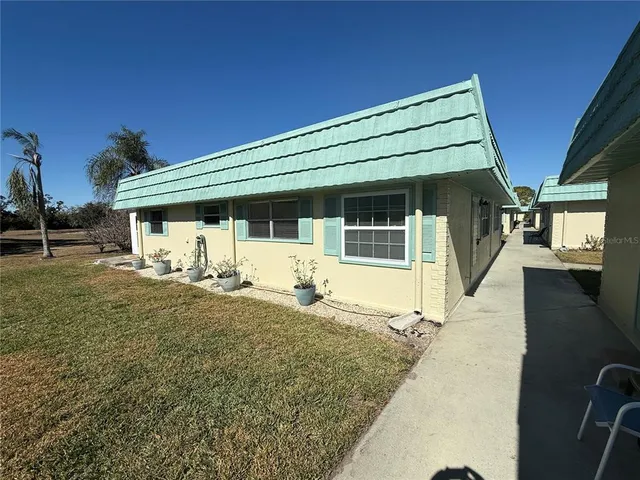 a view of a house with a patio
