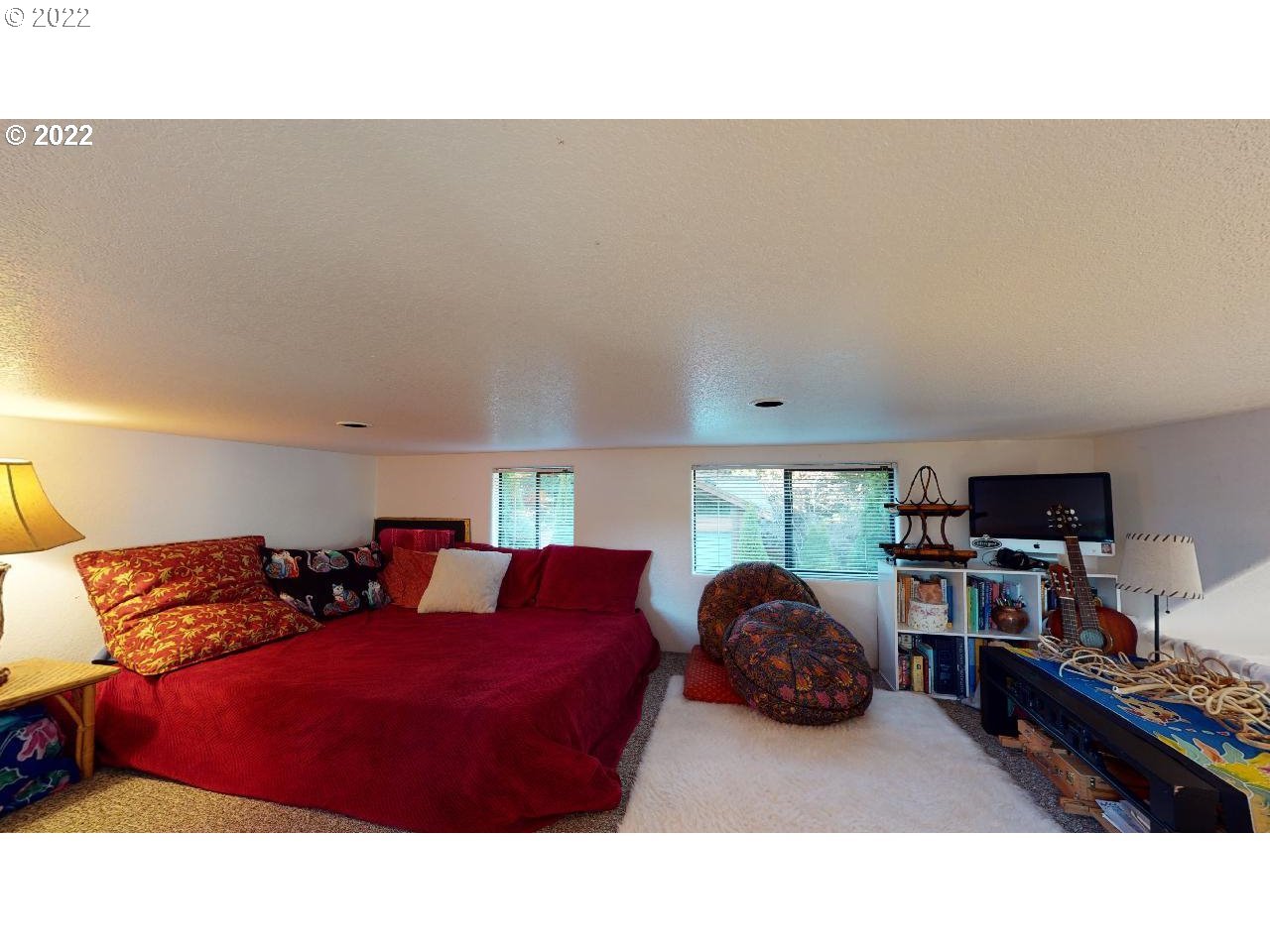 97748 North Bank Chetco River Road, Unit 11 Brookings, OR 97415 - Photo 25 of 32 a living room with furniture and a large window