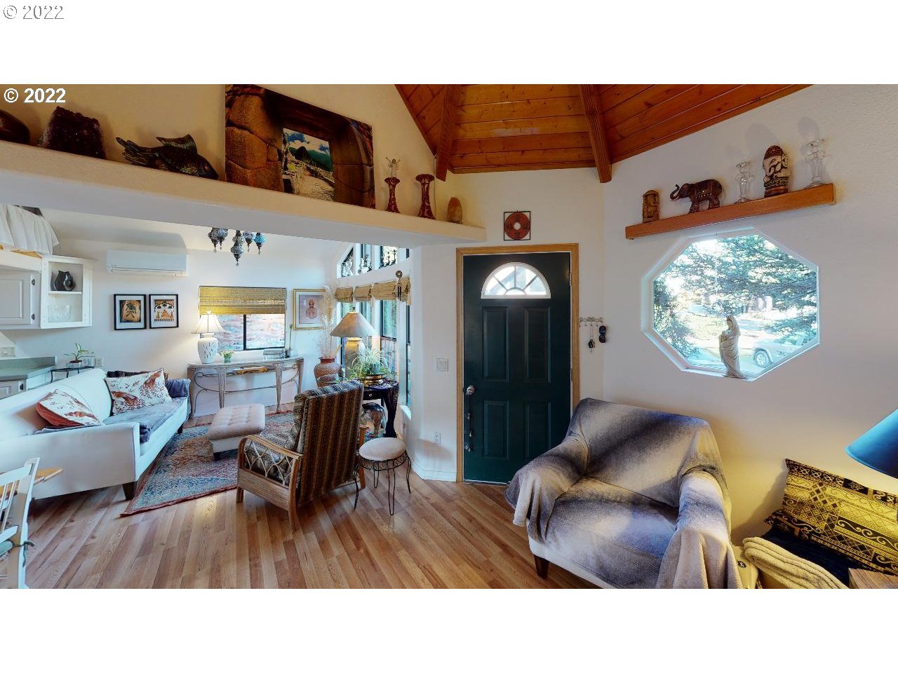97748 North Bank Chetco River Road, Unit 11 Brookings, OR 97415 - Photo 6 of 32 a living room with furniture and a large window