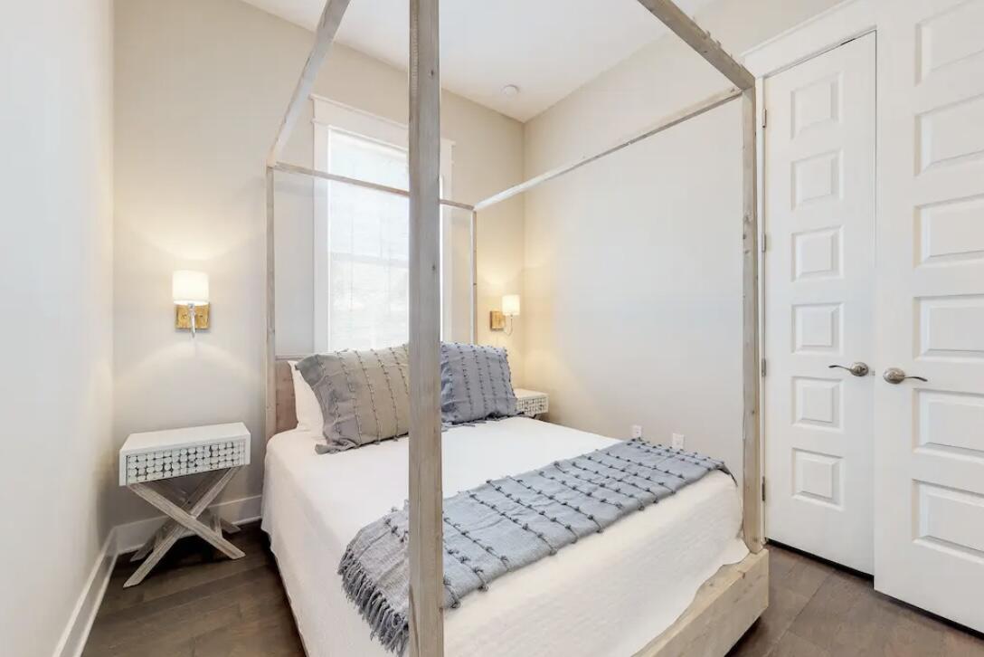 106 York Ln Inlet Beach, Unit A Inlet Beach, FL 32461 - Photo 20 of 28 a bedroom with a bed and a window