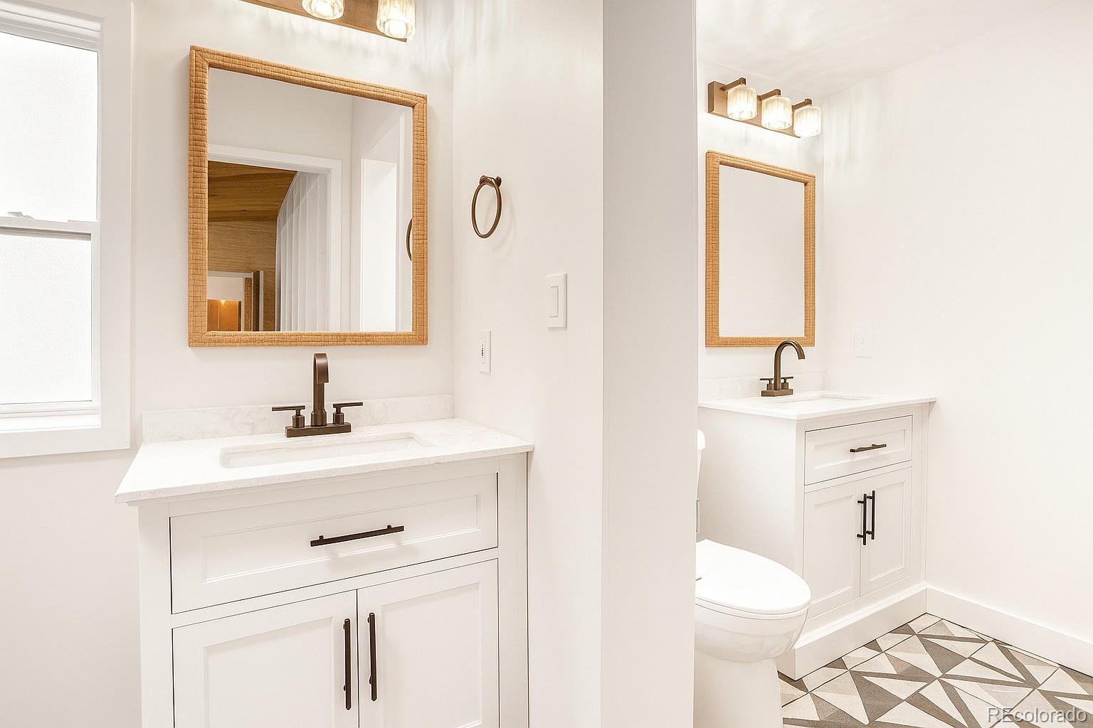 944 County Road 512 Divide, CO 80814 - Photo 29 of 49 a bathroom with a sink toilet and mirror