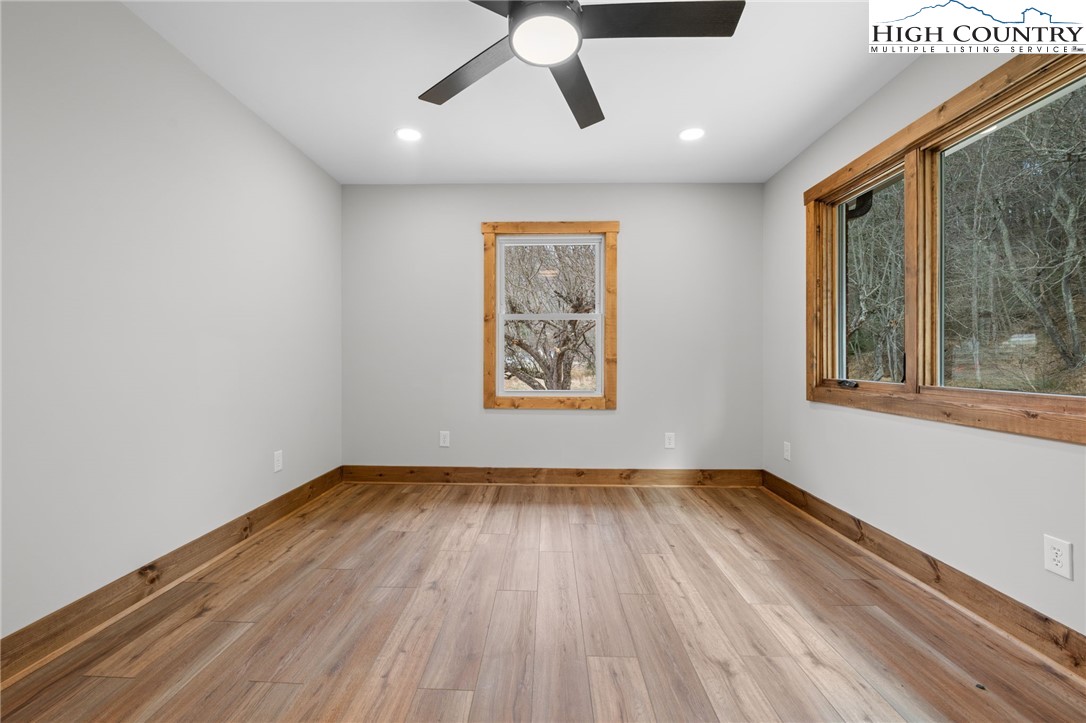 1904 Highway 194 Boone, NC 28607 - Photo 12 of 29 a view of empty room with wooden floor and fan