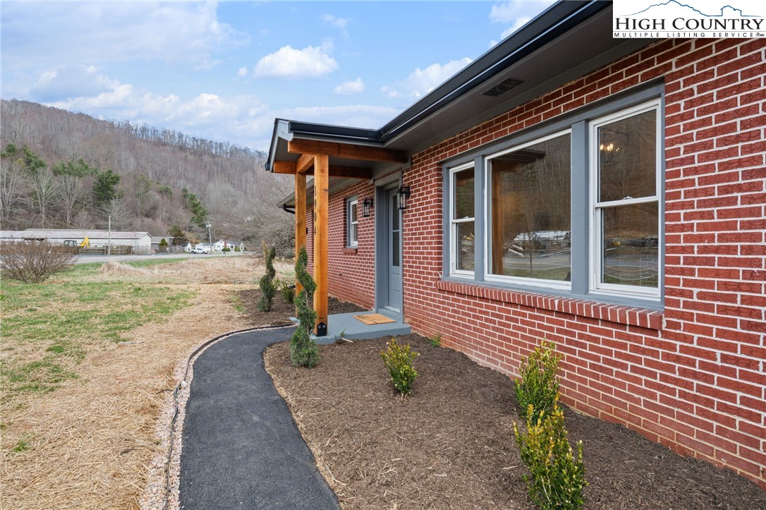 1904 Highway 194 Boone, NC 28607 - Photo 2 of 29 a front view of a house with a yard