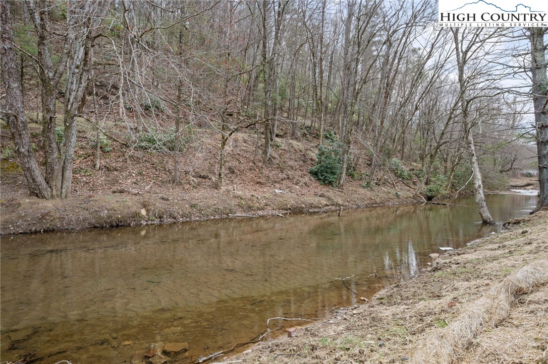 1904 Highway 194 Boone, NC 28607 - Photo 23 of 29 a view of a lake with a mountain