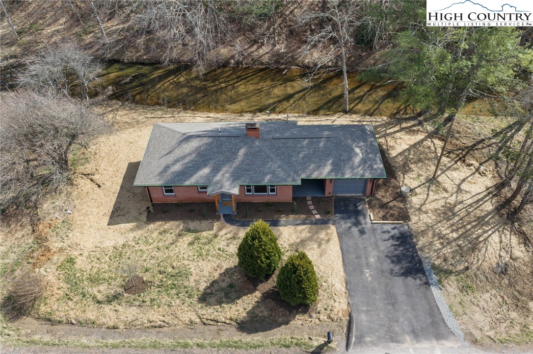 1904 Highway 194 Boone, NC 28607 - Photo 25 of 29 a view of a house with a yard
