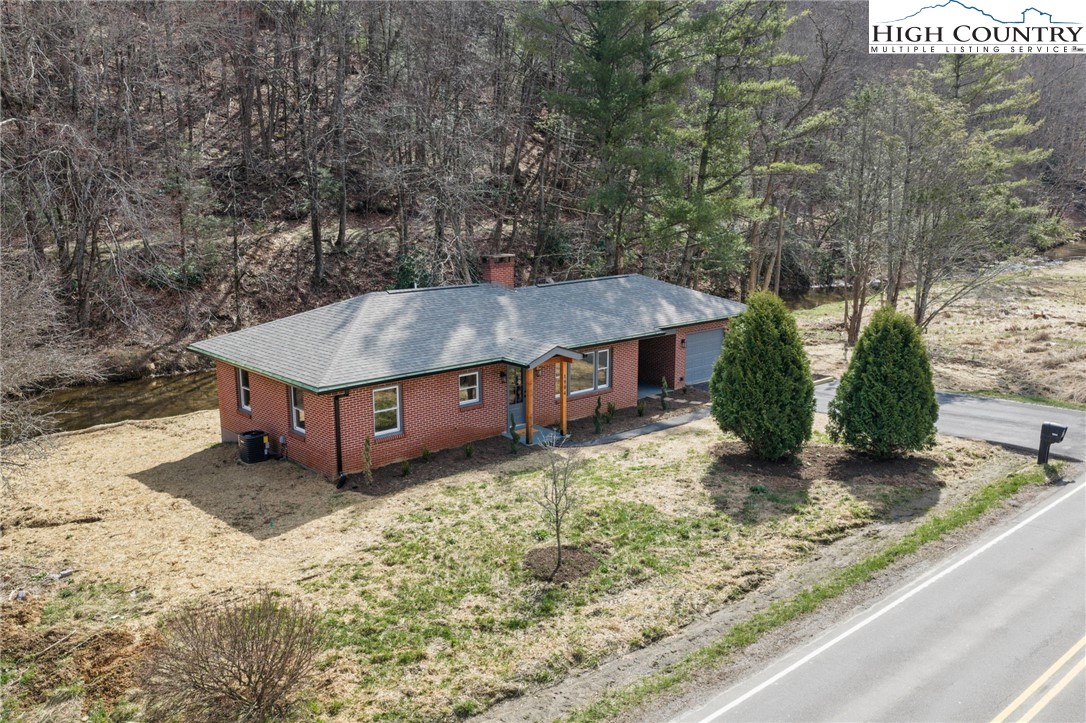 1904 Highway 194 Boone, NC 28607 - Photo 28 of 29 front view of a house with a yard