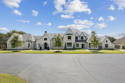 a front view of house with outdoor space and swimming pool
