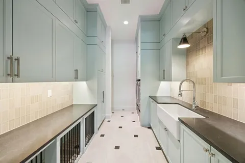 a view of an empty room with a fireplace