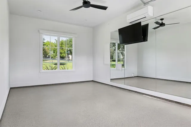 a view of a swimming pool with a patio and a yard