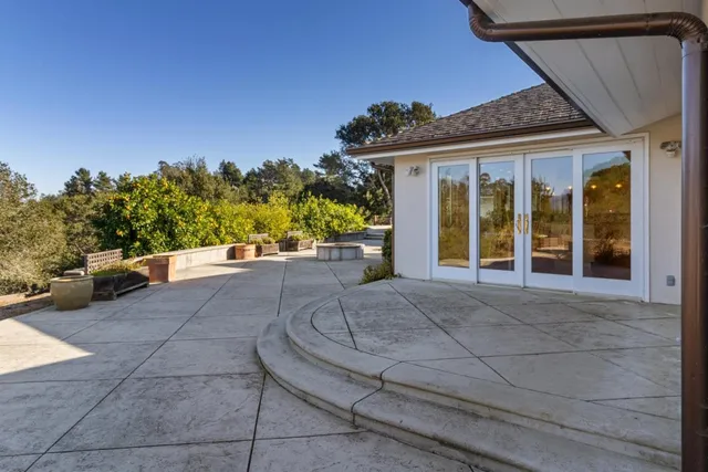 an aerial view of residential house with yard