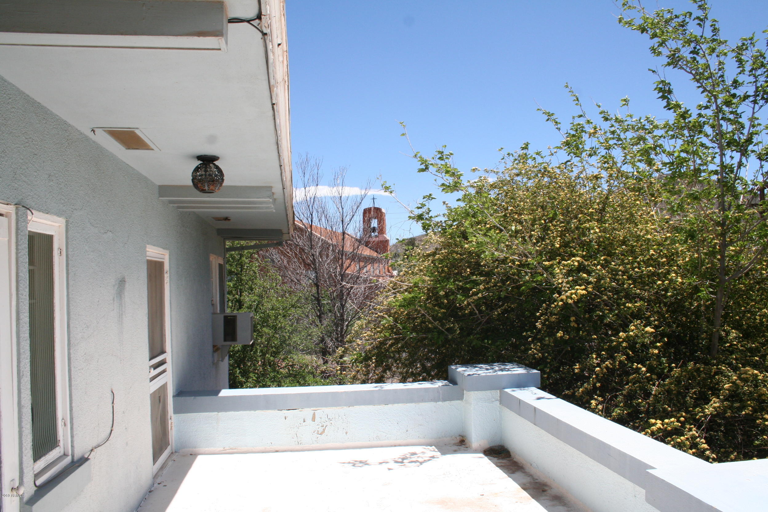 200 E Vista Bisbee, AZ 85603 - Photo 19 of 96 Master 1 balcony (church view)