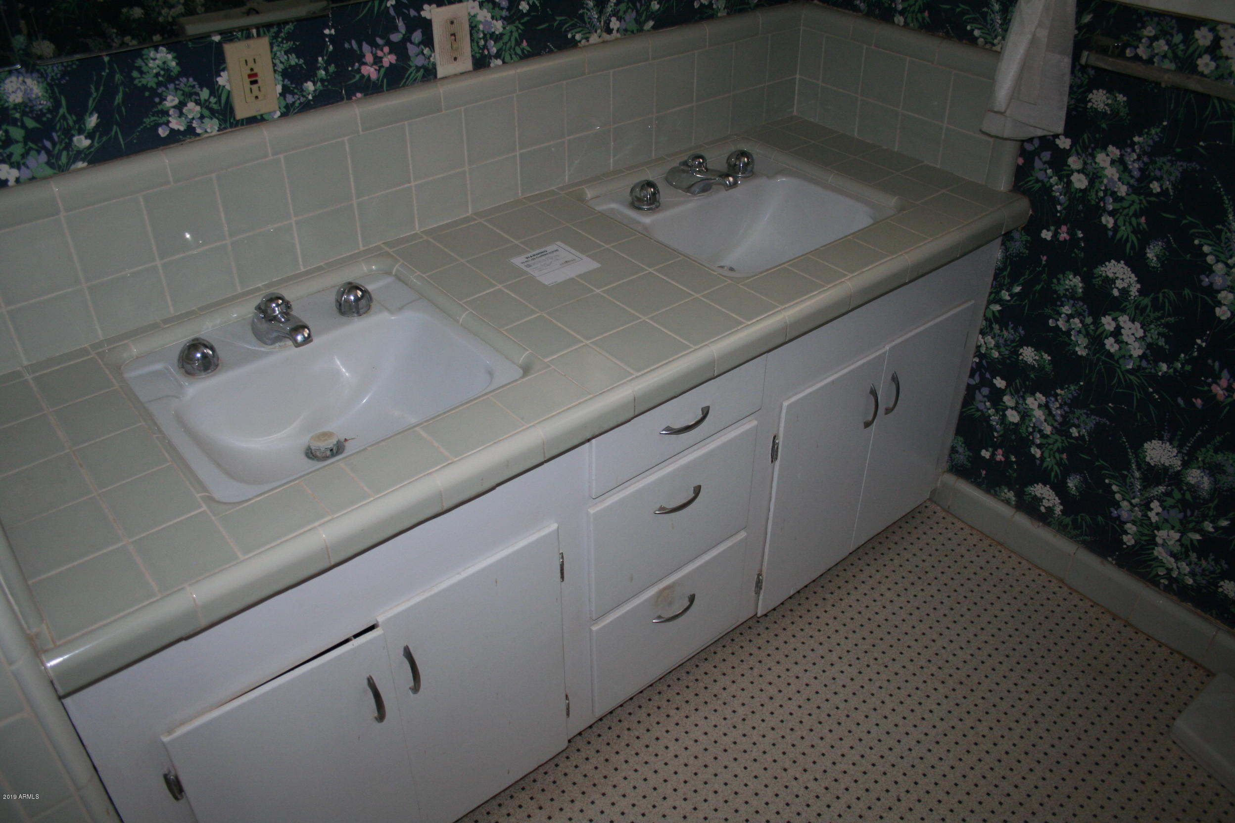 200 E Vista Bisbee, AZ 85603 - Photo 23 of 96 a close view of sink and tap