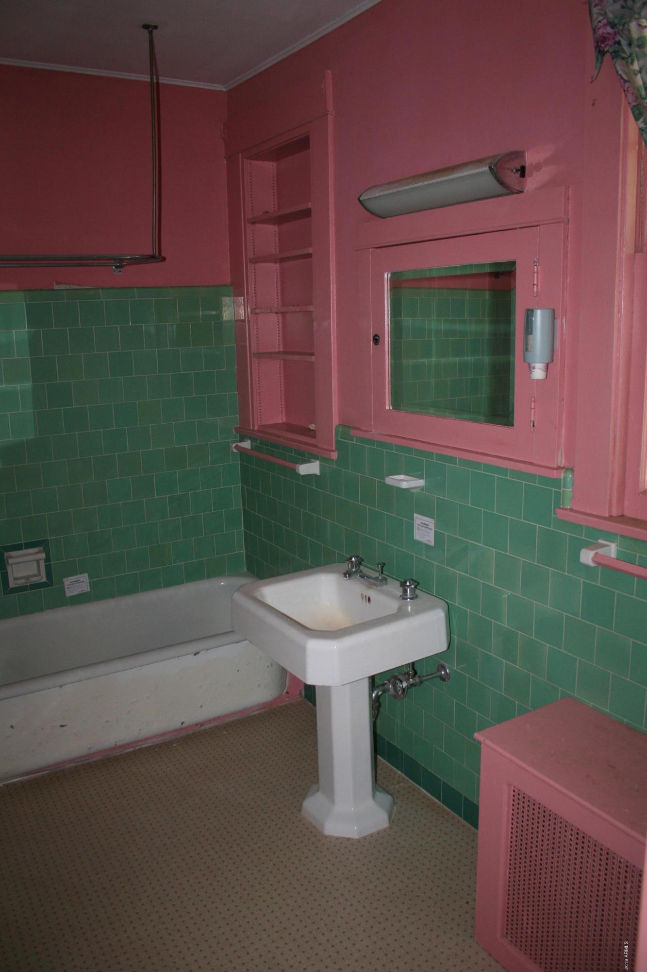 200 E Vista Bisbee, AZ 85603 - Photo 28 of 96 a bathroom with a sink and a mirror