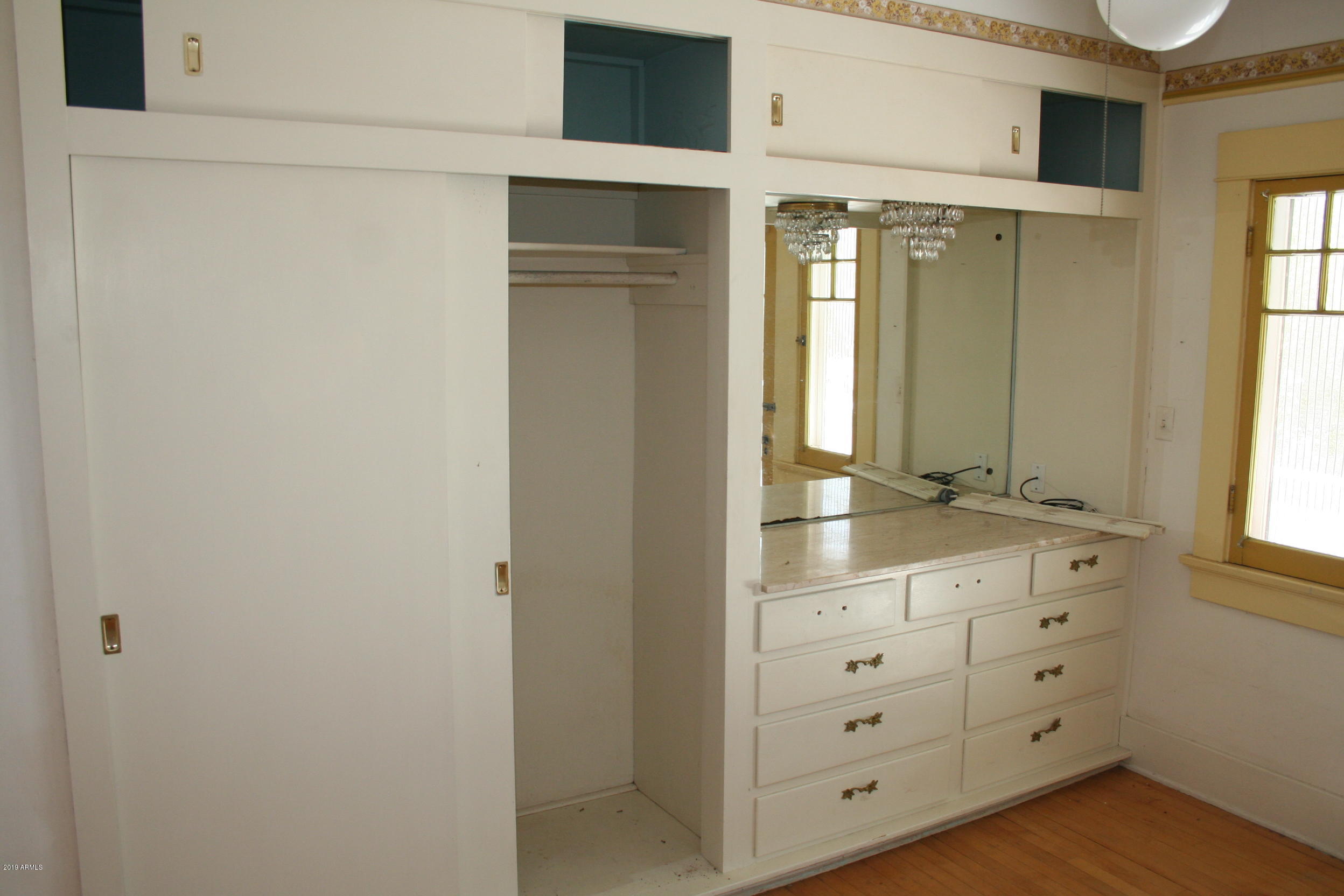 200 E Vista Bisbee, AZ 85603 - Photo 41 of 96 a bathroom with a double vanity sink and mirror