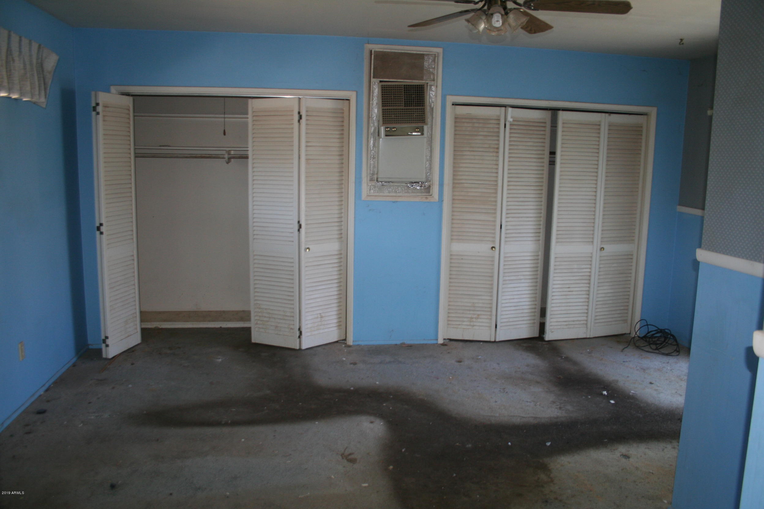 200 E Vista Bisbee, AZ 85603 - Photo 50 of 96 an empty room with closet