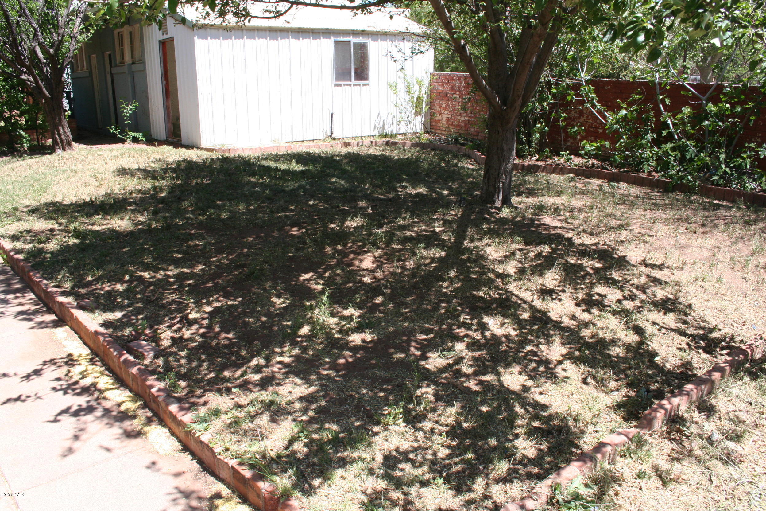 200 E Vista Bisbee, AZ 85603 - Photo 53 of 96 a view of a house with a tree