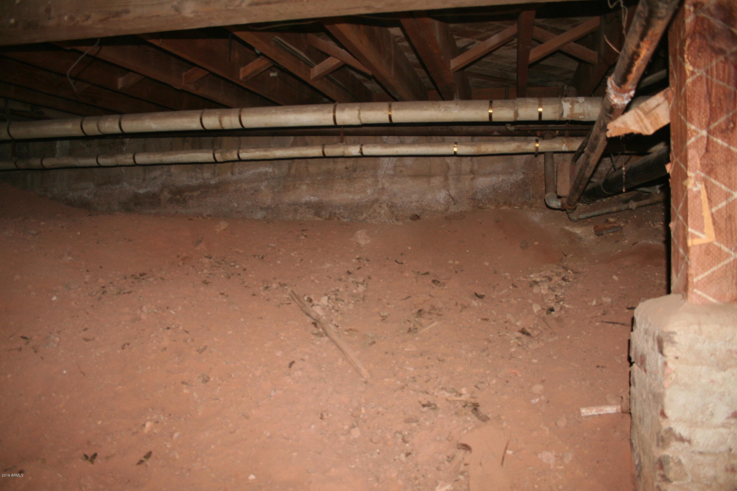 200 E Vista Bisbee, AZ 85603 - Photo 68 of 96 a view of a room with rack on the wall