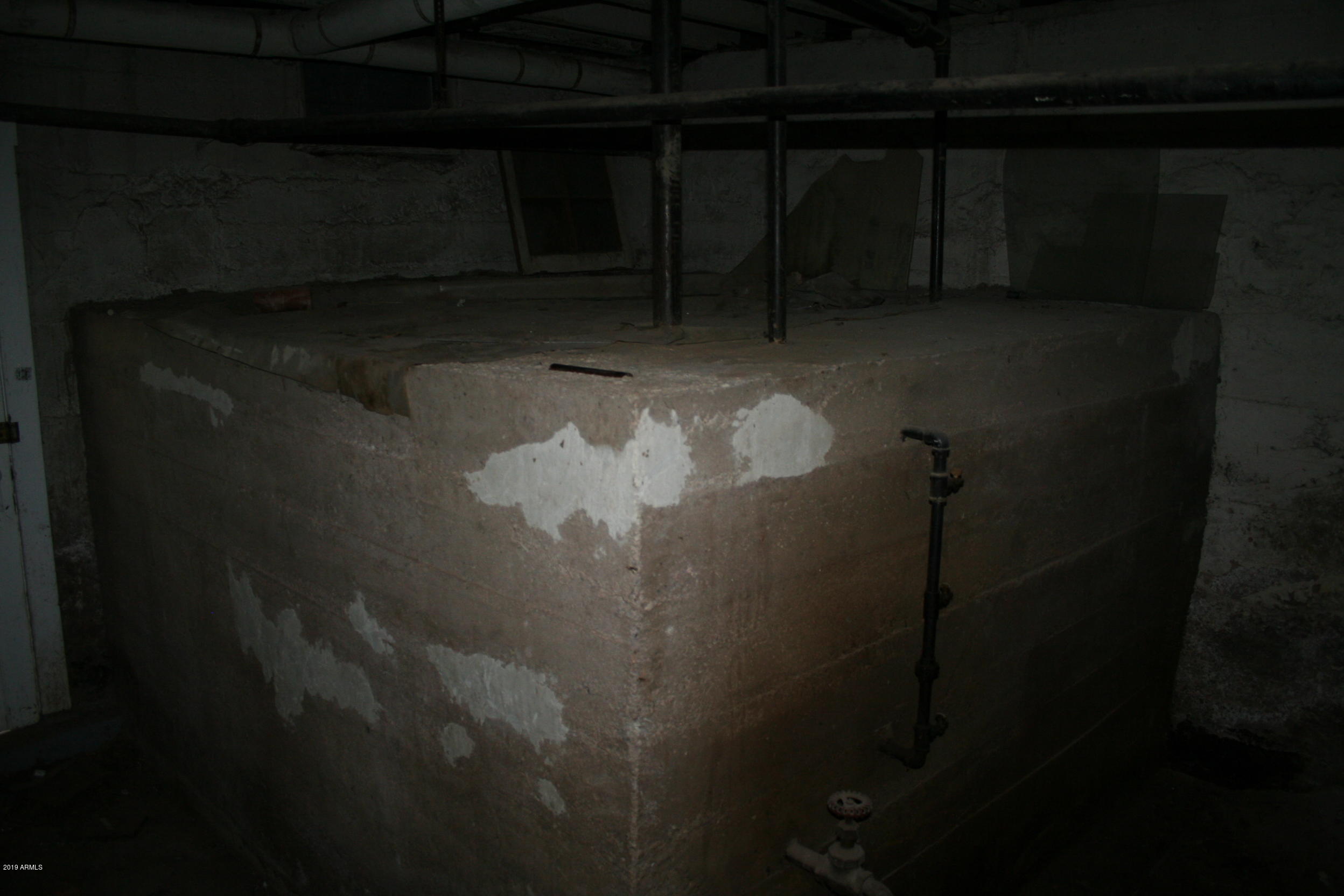 200 E Vista Bisbee, AZ 85603 - Photo 75 of 96 Boiler room (holding tank for water)