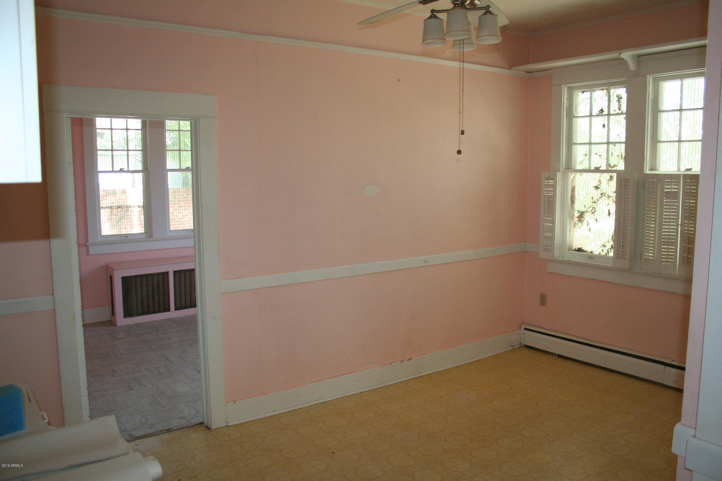 200 E Vista Bisbee, AZ 85603 - Photo 76 of 96 a view of an empty room with a window