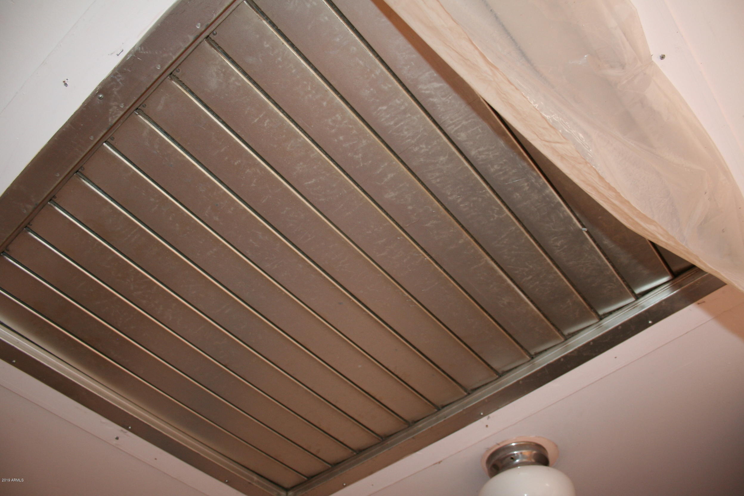 200 E Vista Bisbee, AZ 85603 - Photo 79 of 96 Hallway upstairs (vent in ceiling)