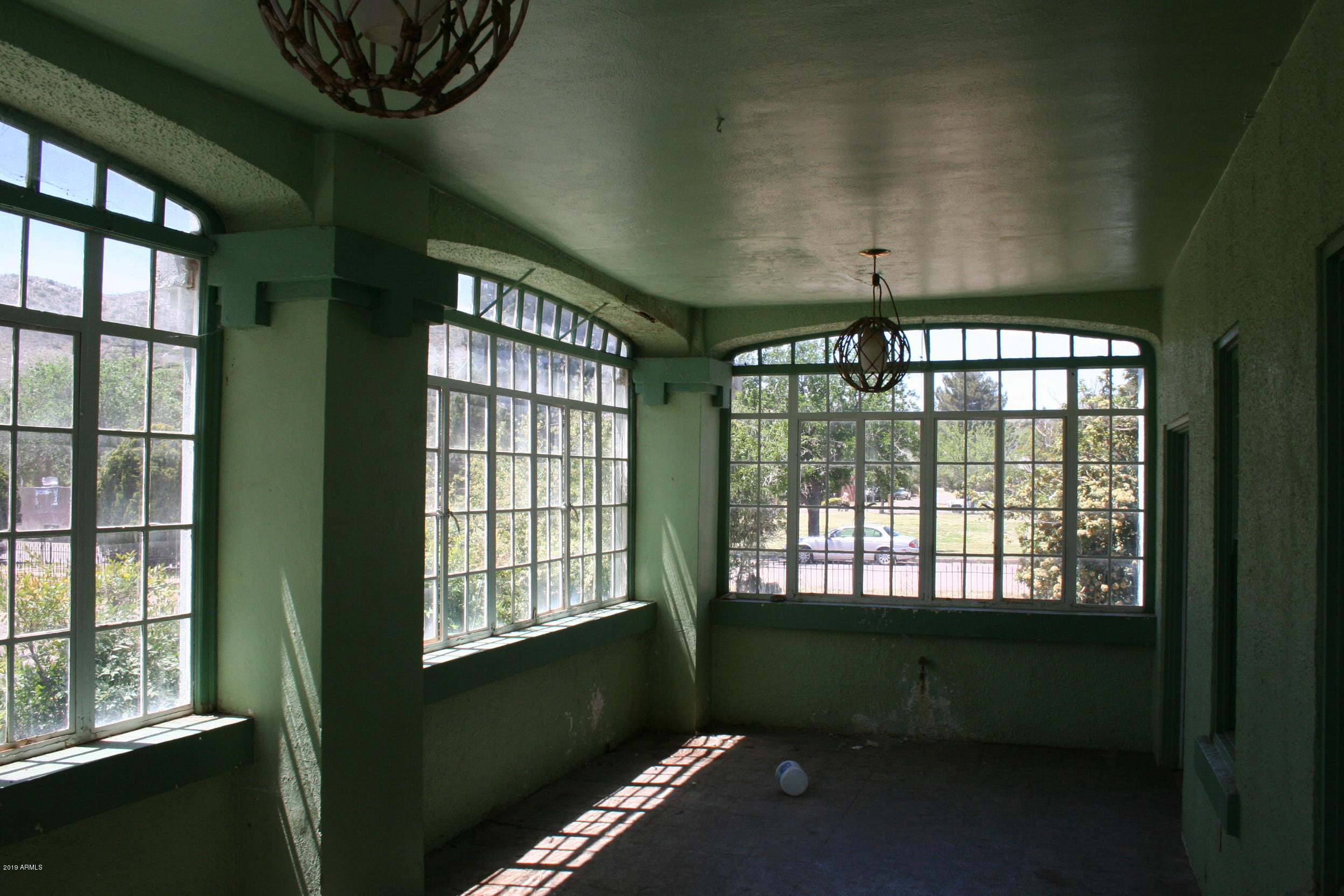 200 E Vista Bisbee, AZ 85603 - Photo 82 of 96 a living room with furniture and a window