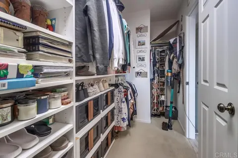 a bathroom with a tub and shower