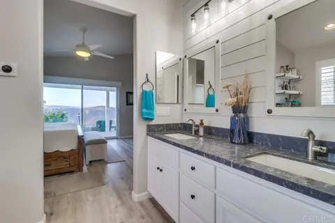 a bedroom with bed and a closet