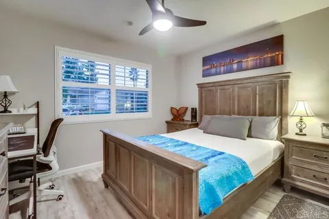 a view of a house with a yard and a garden