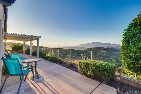 a view of a city with a mountain in the background