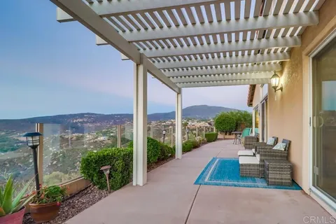a view of a swimming pool with a lake view