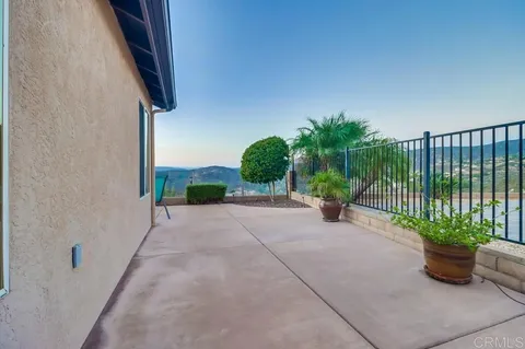 a view of an outdoor space and tennis court